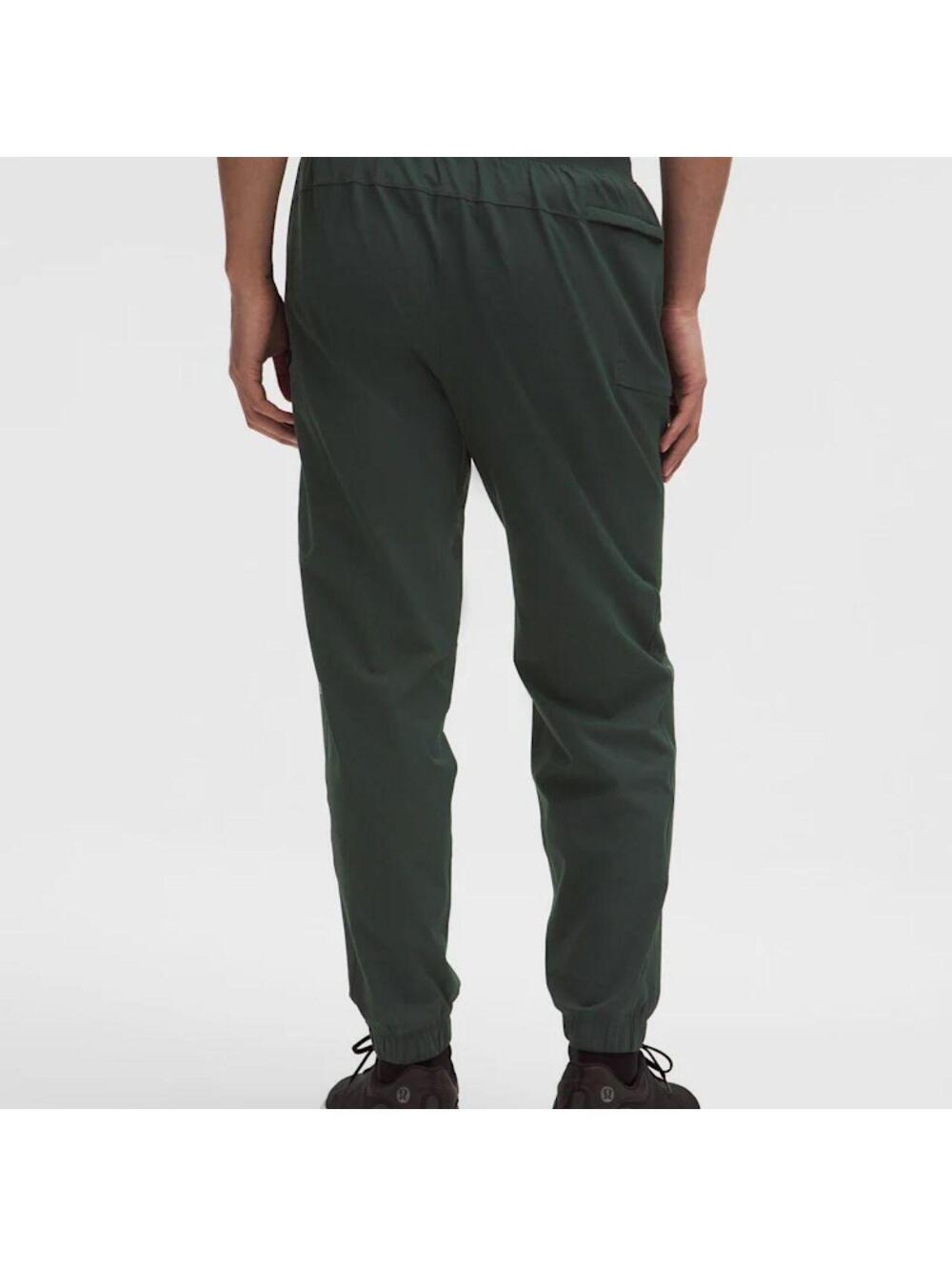 Lululemon Men's Dark Green Jogger Pants with Elastic Cuffs and Zip Pocket
